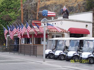 catalina island golf cart rentals fron Island Rentals  in Avalon on Catalina Island  NOTE the flags are at half staff to commemorate 9/11/2001  pictur taken 9/11/2011 