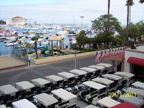 Catalina Island , Avalon Harbor view from above catalina island golf cart rentals fron Island Rentals  in Avalon on Catalina Island  NOTE the flags are at half staff to commemorate 9/11/2001  pictur taken 9/11/2011 